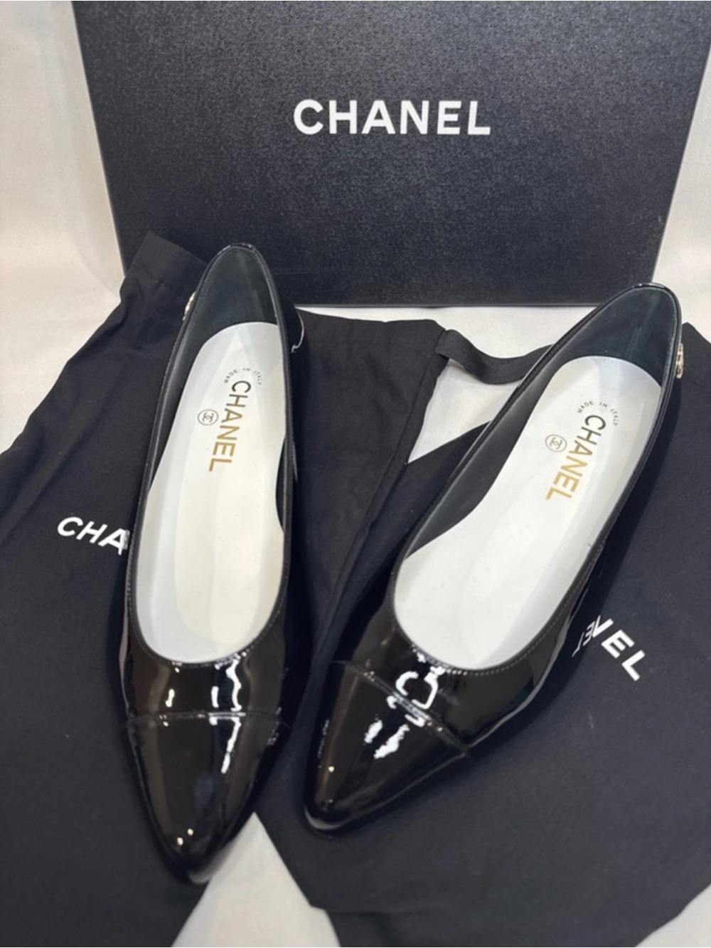 CHANEL Black Patent Leather Pointed Ballet Flats with Gold CC Accent